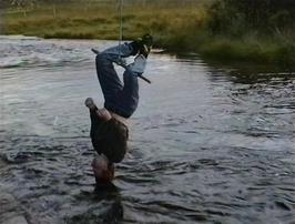 Jon Burgess decides he is just too long for the swing, but finds a solution that only wets his hair
